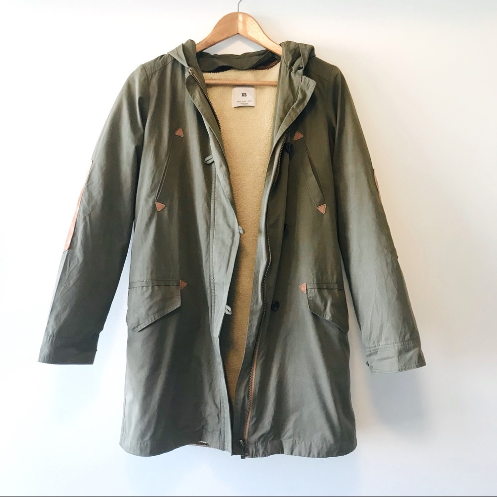 Hooded long jacket with faux fur lining and elbow patches